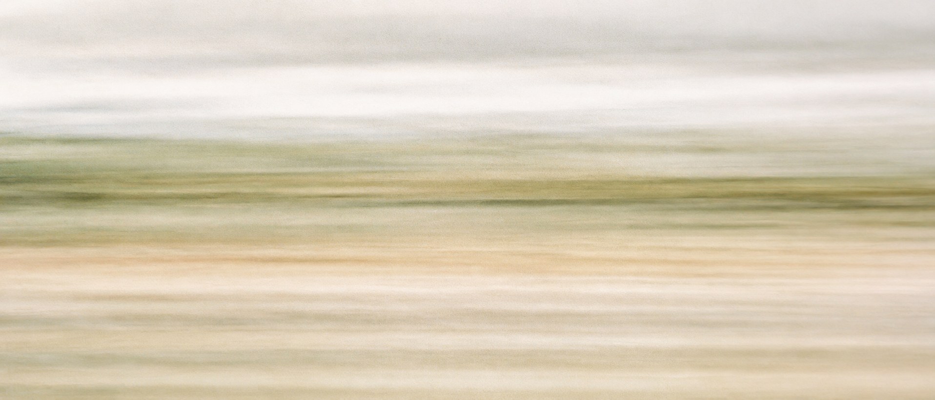 Soft horizontal bands of pale colour, an abstract long exposure from a moving train